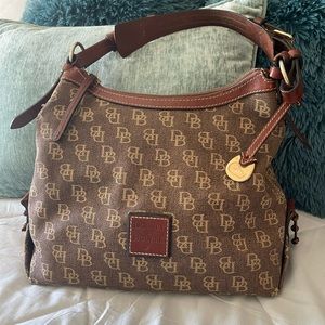 brown fabric purse with leather trim. Apprx: 12.5”x 9”x 4.5”